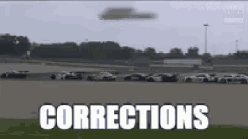 a group of cars are racing on a race track and the word corrections is on the bottom right