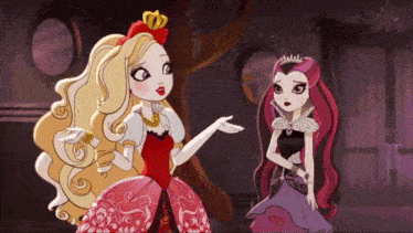 two dolls are standing next to each other in a room