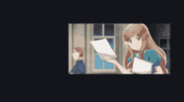 a blurry picture of a woman holding a piece of paper