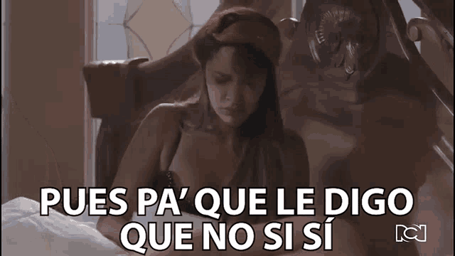 a woman laying on a bed with the words " pues pa que le digo que no si si "