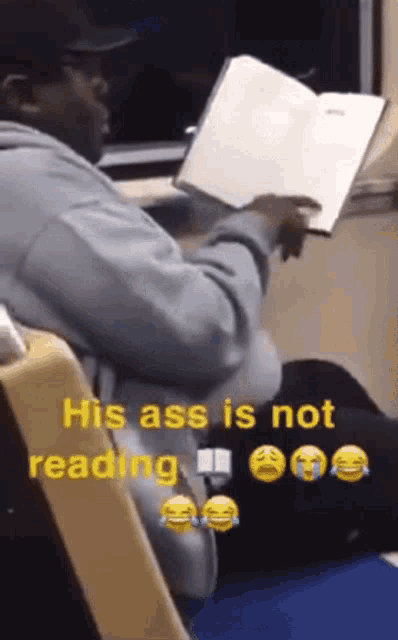 a man is reading a book on a train with a caption that reads his ass is not reading