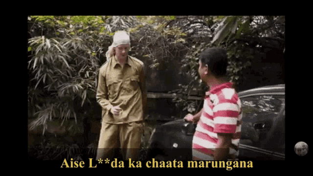 a man in a striped shirt is standing next to a man in a military uniform and says aise
