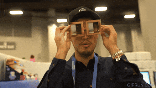 a man wearing a lanyard that says lenovo