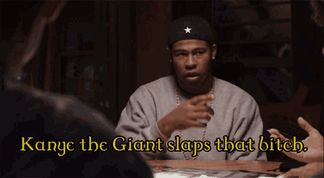 kanye the giant slaps that bitch is written on the screen