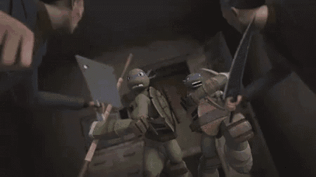 a group of teenage mutant ninja turtles are fighting a man with a knife .