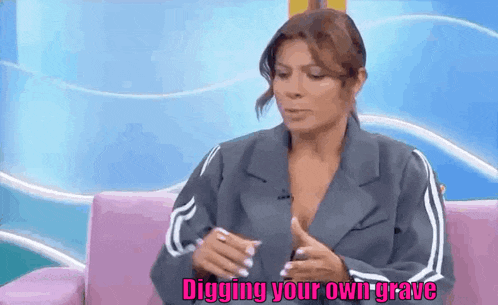 a woman is sitting on a pink couch with the words `` digging your own grave '' written on the screen .
