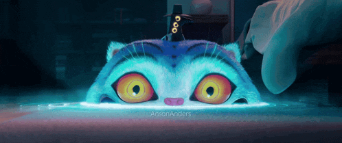 a cartoon cat with a crow on its head is being touched by a person