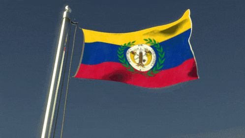 a flag with the letter b on it is flying in the wind
