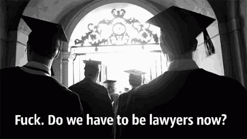 a black and white photo of a group of graduates with the words " fuck do we have to be lawyers now " on the bottom