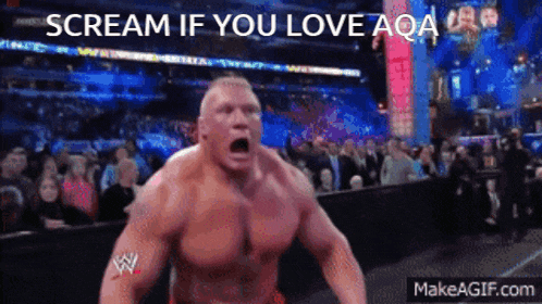 a wrestler is screaming in front of a crowd with the words scream if you love aqa below him