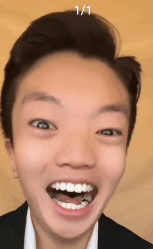a close up of a person 's face with the number 1 / 1 above it