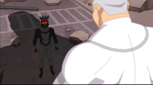 a man in a white shirt stands next to a black superhero with red eyes