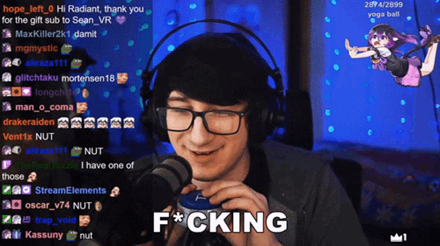 a man wearing glasses and headphones says f * cking in front of a microphone