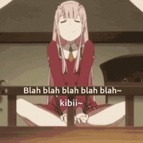 a girl in a red dress is sitting on the floor with her legs crossed