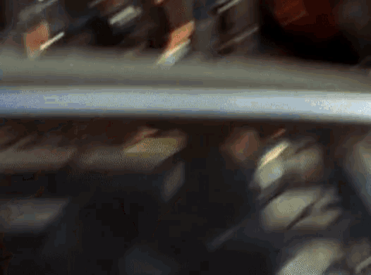 a blurry picture of a person in a car