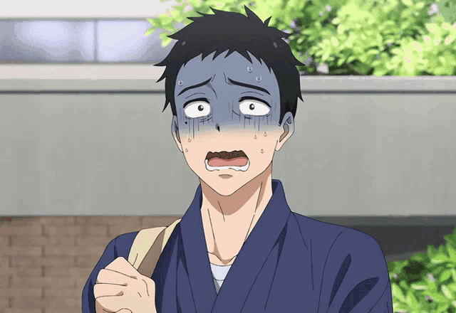 a man with a surprised look on his face is wearing a kimono