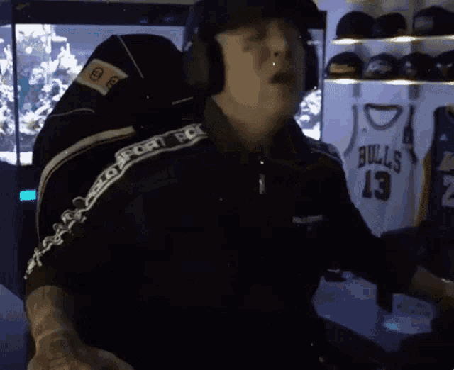 a person wearing headphones and a belt that says " moto for "