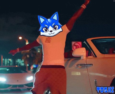 a man with a blue cat on his face is standing in front of a car that says toshi on it