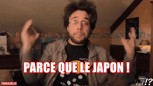 a man wearing glasses and a black shirt with the words " parce que le japon " on it