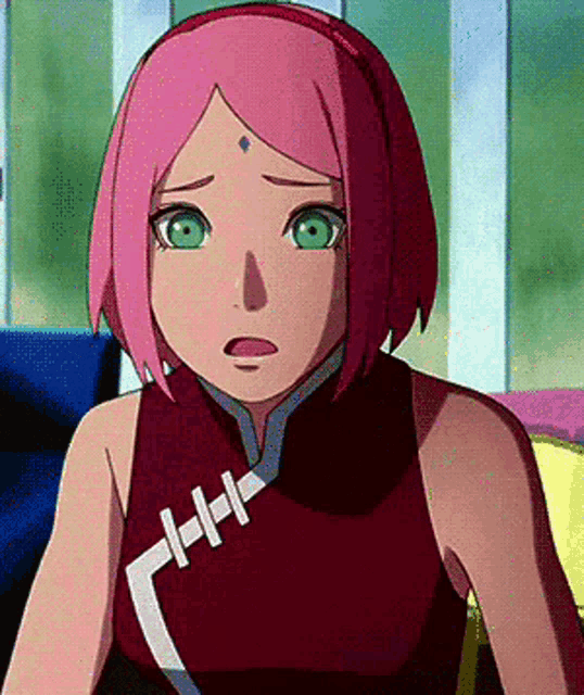 a cartoon girl with pink hair and green eyes is wearing a red shirt .