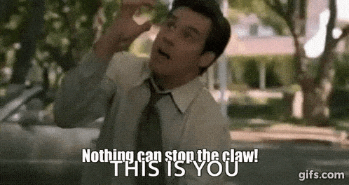 a man in a suit and tie is saying nothing can stop the claw this is you .