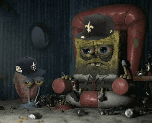 spongebob wearing a new orleans saints hat sits on a chair