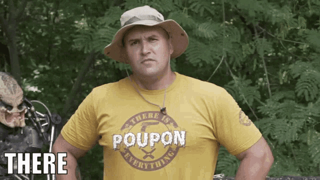 a man wearing a yellow shirt that says " poupon " on it