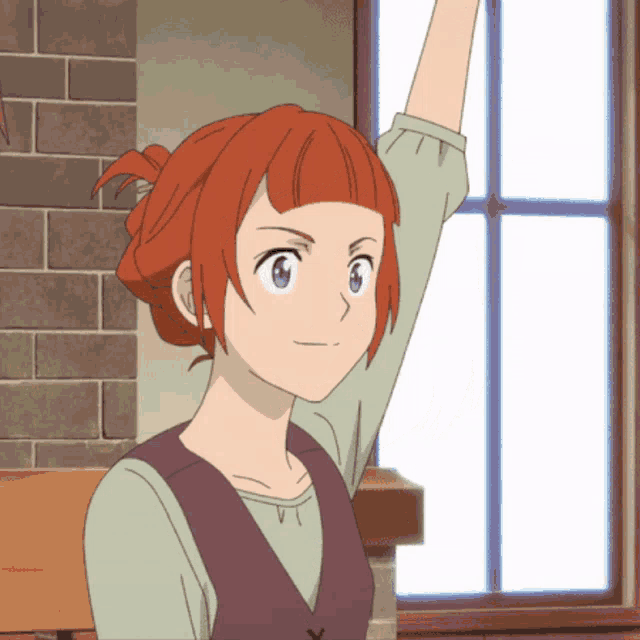 a girl with red hair and blue eyes is raising her arm in front of a window