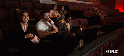 Watching A Movie Darren Criss GIF - Watching A Movie Darren Criss David Corenswet GIFs