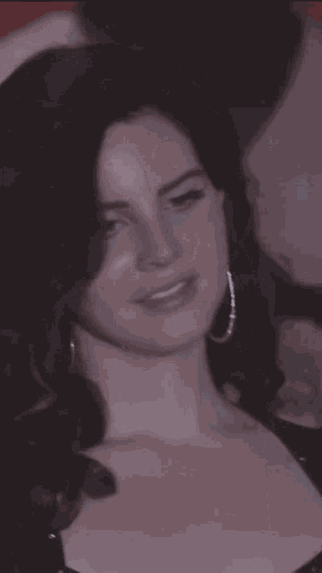 a close up of a woman with her mouth open