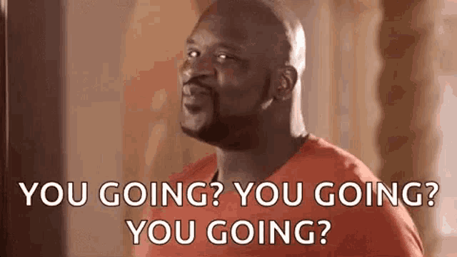 a bald man in a red shirt is asking , `` you going ? you going ? you going ? '' .