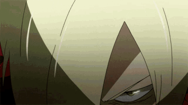 a close up of a cartoon character 's face with white hair and green eyes