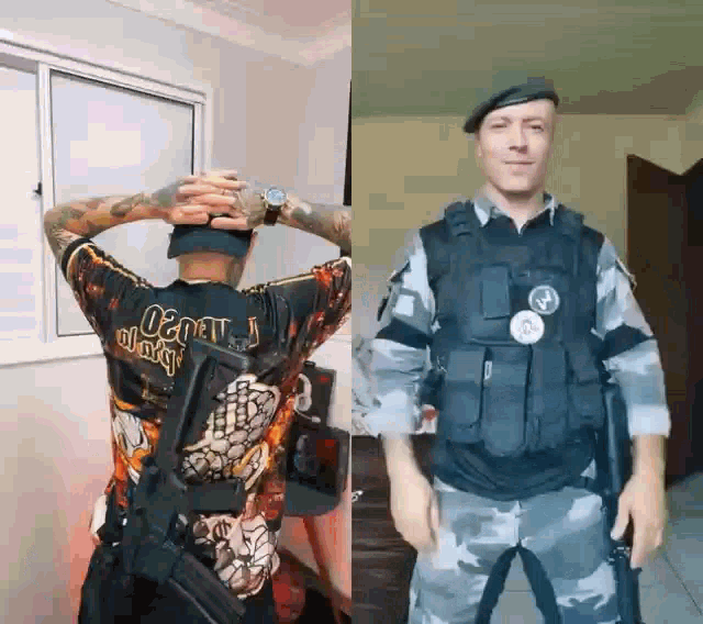 a man in a military uniform is holding a gun and wearing a hat .