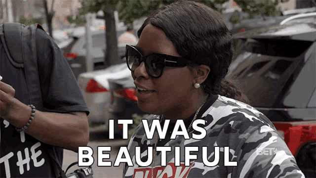 a woman wearing sunglasses and a camo shirt says " it was beautiful "