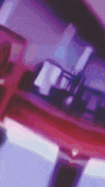a purple and pink background with a few lines