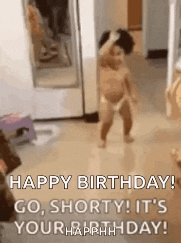 a baby in a diaper is dancing in a room .