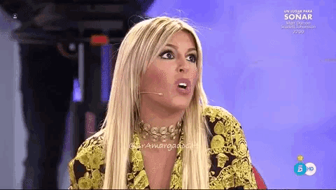 a woman is talking into a microphone in front of a sign that says sonar on it