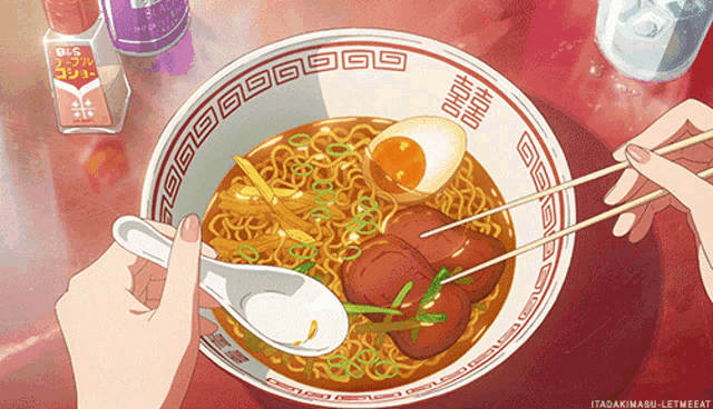 a person is eating ramen with chopsticks and a bottle of b 's seasoning behind them