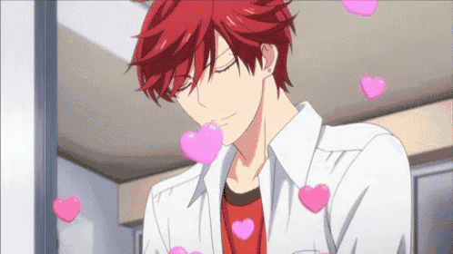 a boy with red hair is surrounded by pink hearts .