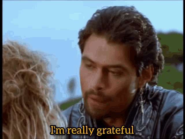 a man says i 'm really grateful while looking at a woman