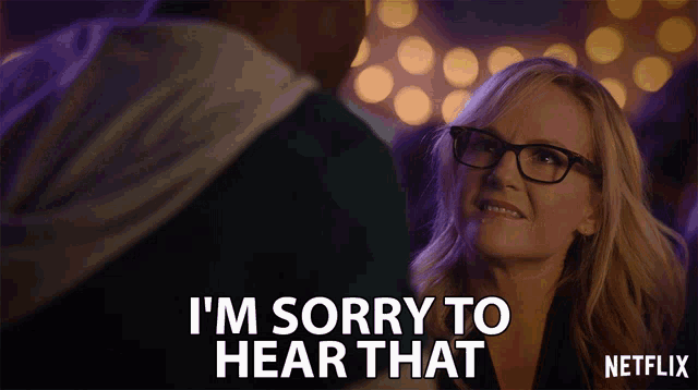 a woman says i 'm sorry to hear that in front of a man