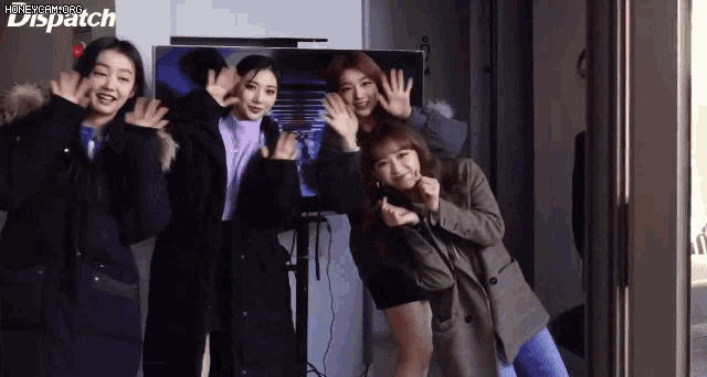 a group of girls are posing for a picture with the word dispatch in the upper right corner