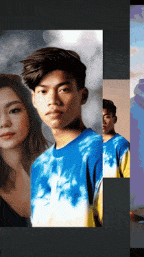 a young man in a blue tie dye shirt stands next to a young woman