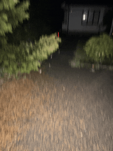 a blurred image of a house at night