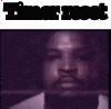 a close up of a man 's face with a purple background and the word breast on the bottom .