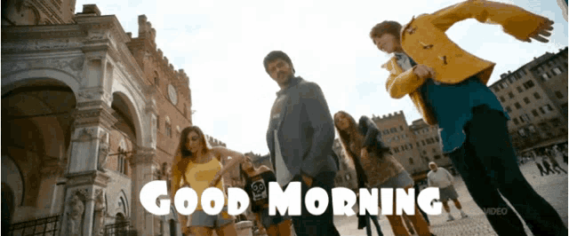 a group of people dancing in front of a building with the words good morning written on the bottom