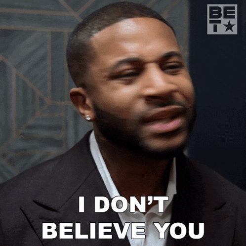 a man in a suit says " i don t believe you "
