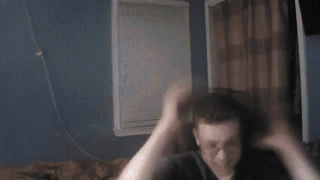 a blurry picture of a person in a room