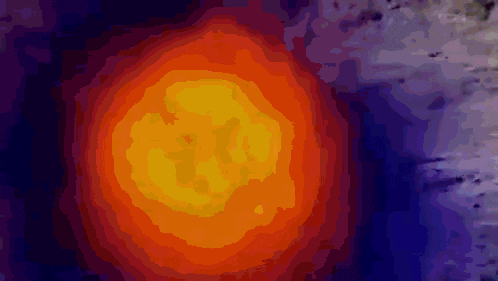 a painting of a red and yellow circle on a dark background