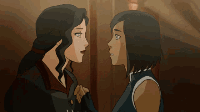 a couple of women standing next to each other